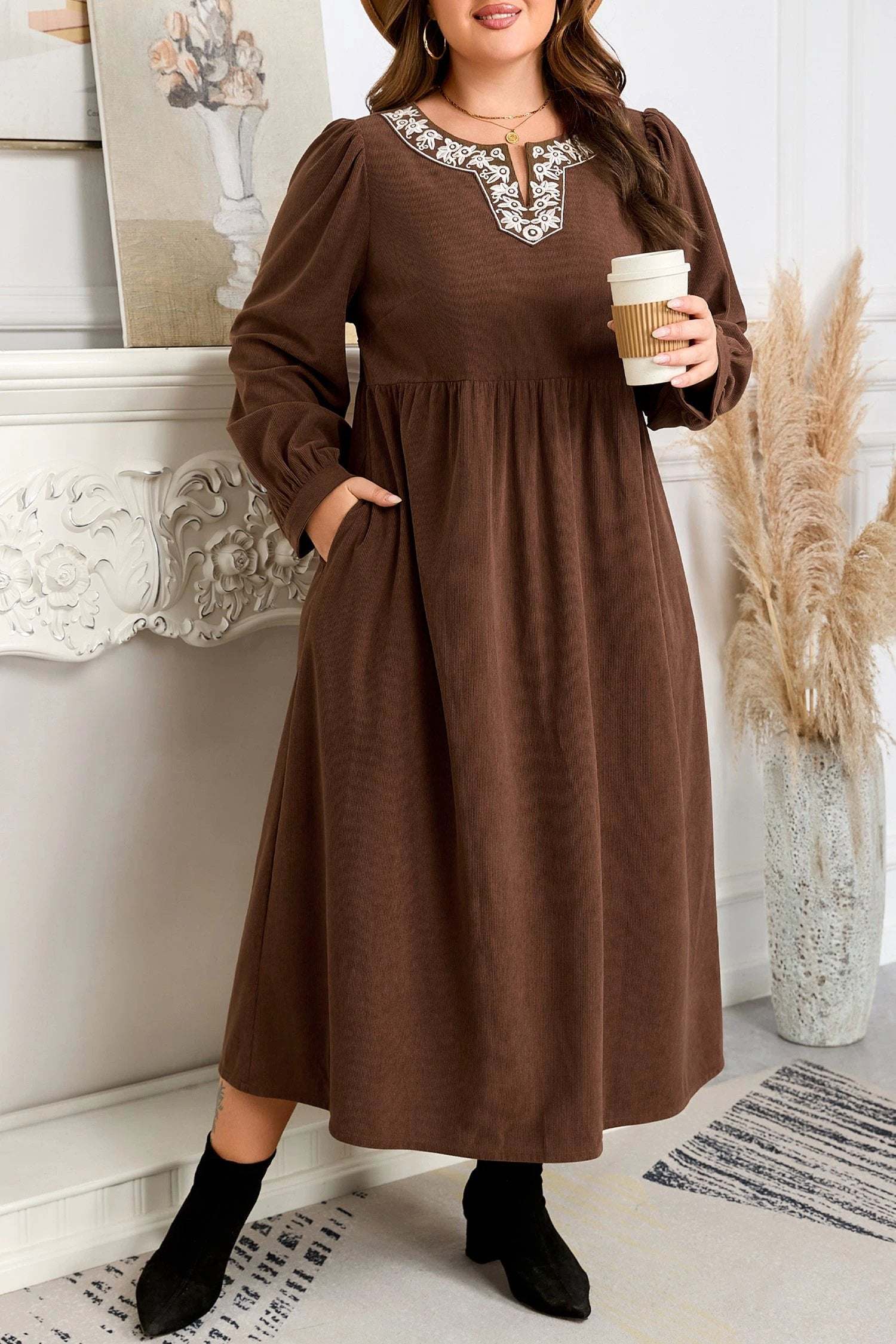 Plus size embroidered midi dress with notched neckline and long sleeves, showcasing main character energy style