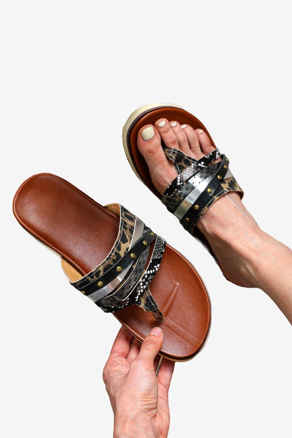 Leopard studded animal print flip flop sandals with cushioned footbed and multi-strap design