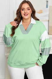 Plus size Cozy Confidence Moment sweatshirt with color block patchwork collar and striped sleeves