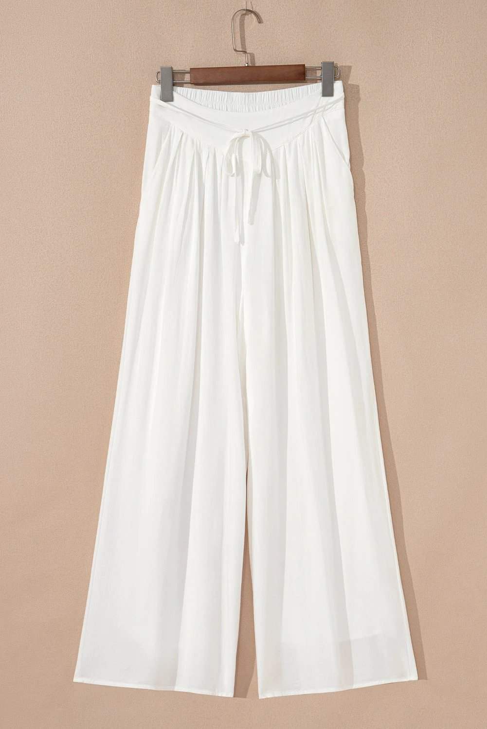 White drop-waist pleated wide-leg cotton-linen pants for mom chic style