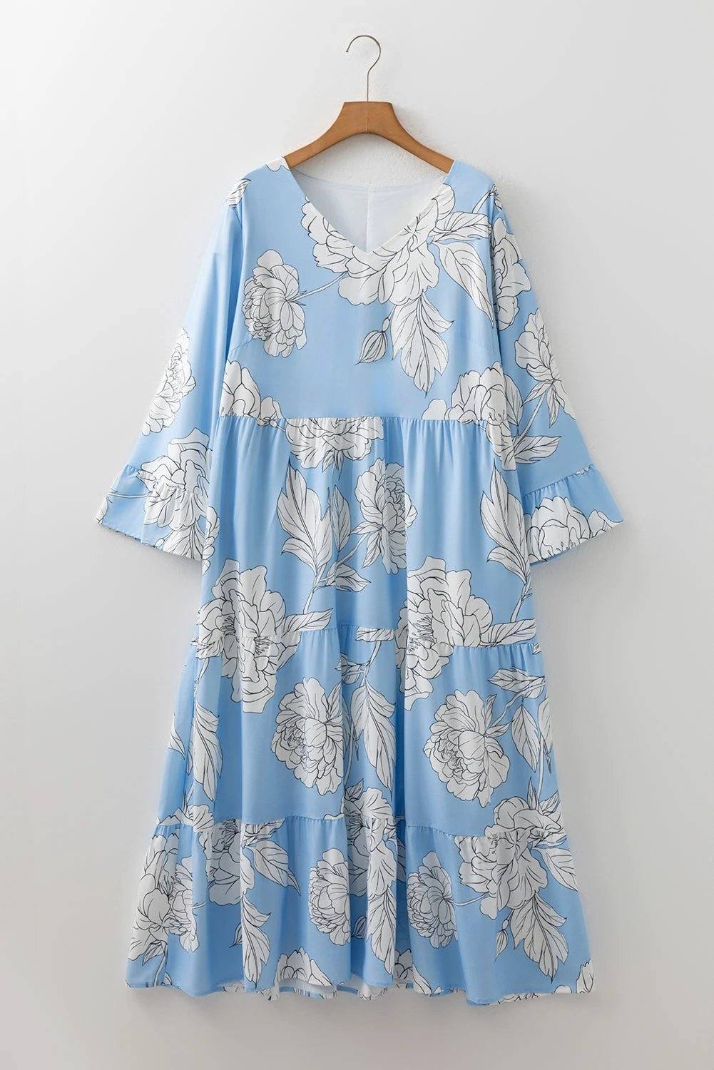 Plus size floral dress with bracelet sleeves and V-neck tiered maxi design