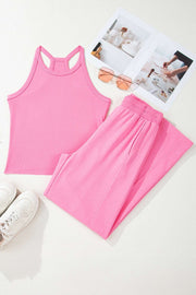 Woman wearing pink slim ribbed tank top and wide-leg sweatpants Mom Energy outfit set