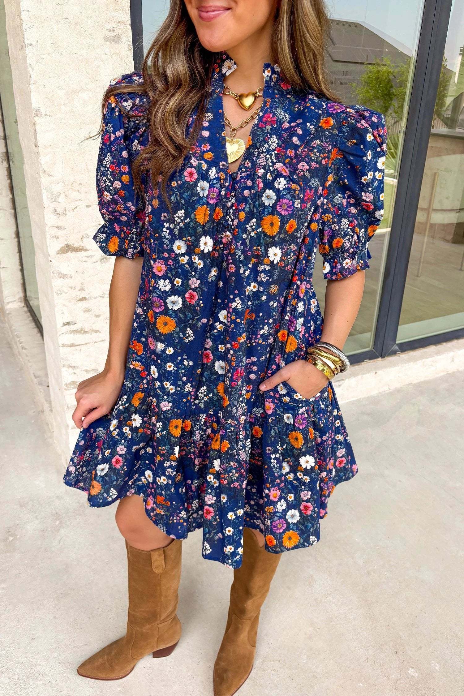 Navy mini dress with wild daisy floral print and puff sleeves