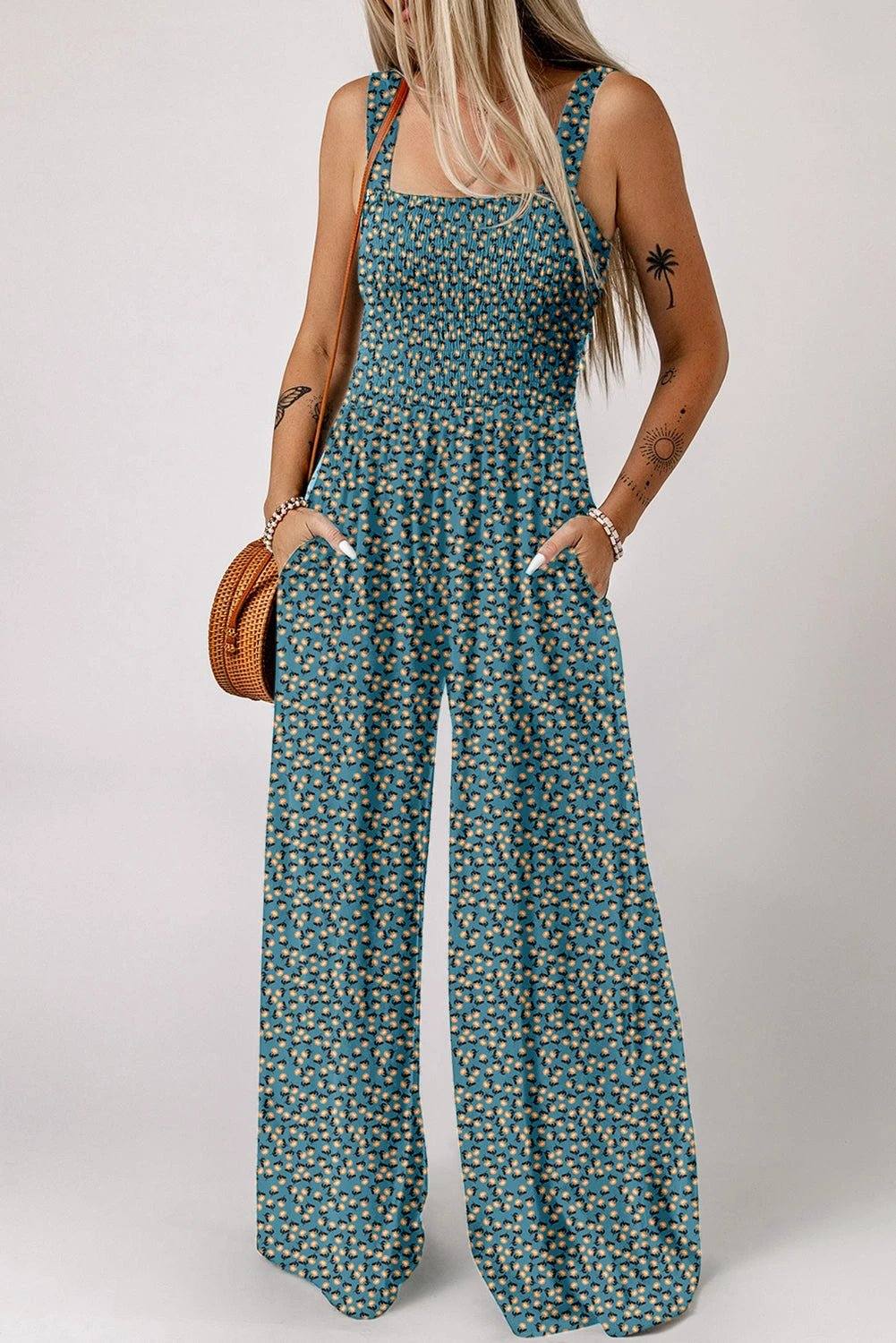 Boho Chic floral smocked square-neck jumpsuit with wide-leg silhouette and dark floral print
