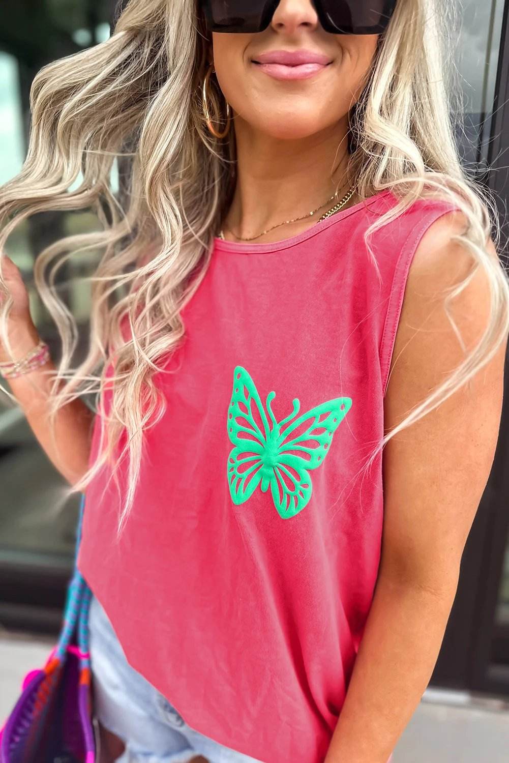 Sun-kissed yellow floral graphic tank top with soft breathable fabric and relaxed fit for casual wear