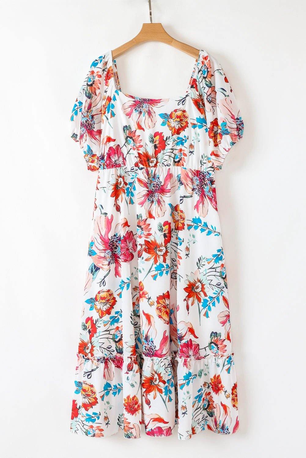 Plus size Sunday Ready floral midi dress with square neckline and puff sleeves on white background