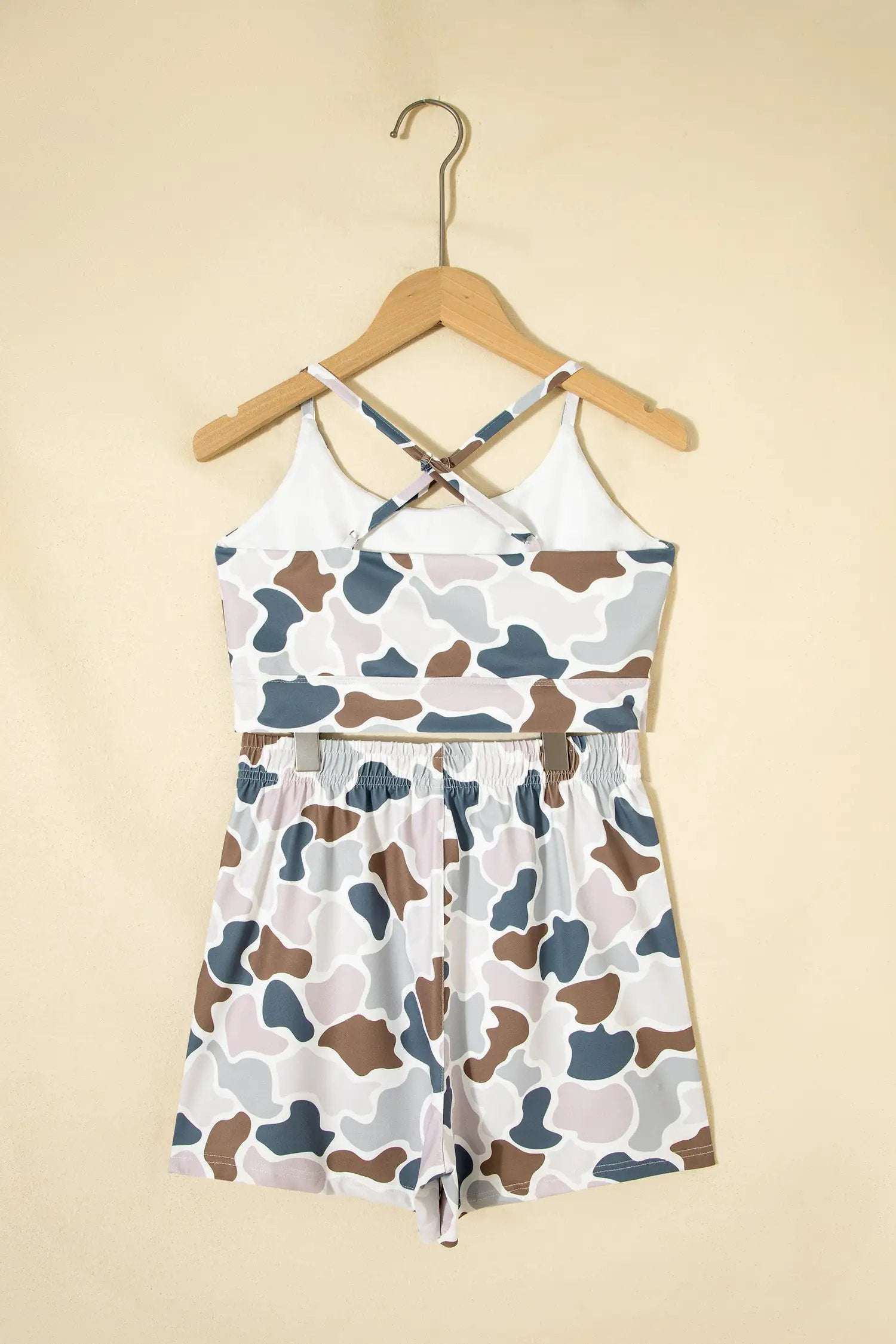 Woman wearing cozy confidence camouflage printed cropped tank two-piece short outfit set