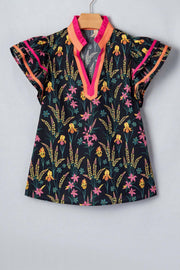 Black floral print tiered blouse with short flutter sleeves and contrast trim