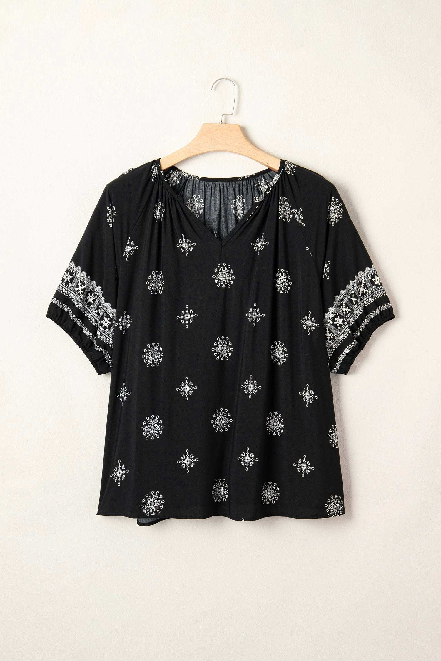 Plus size floral Effortless Boho notched V neck short sleeve top in emerald green
