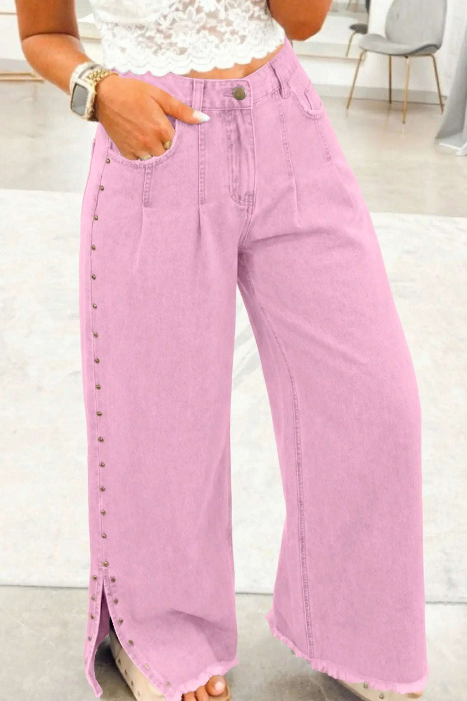 Pink high-rise wide-leg jeans with beaded side detail and split hem