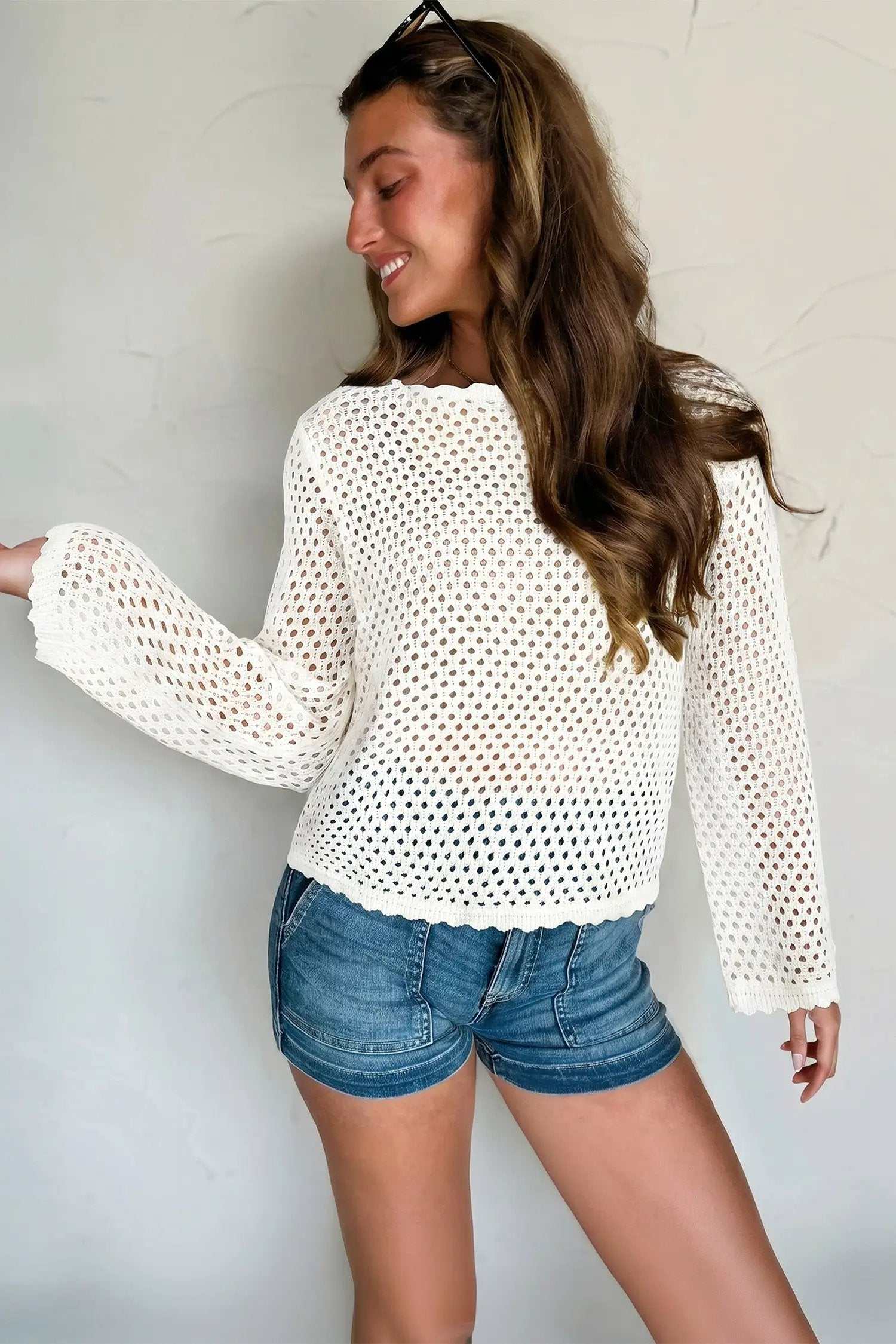 Hollow Out Knit Top with scalloped trim and long sleeves