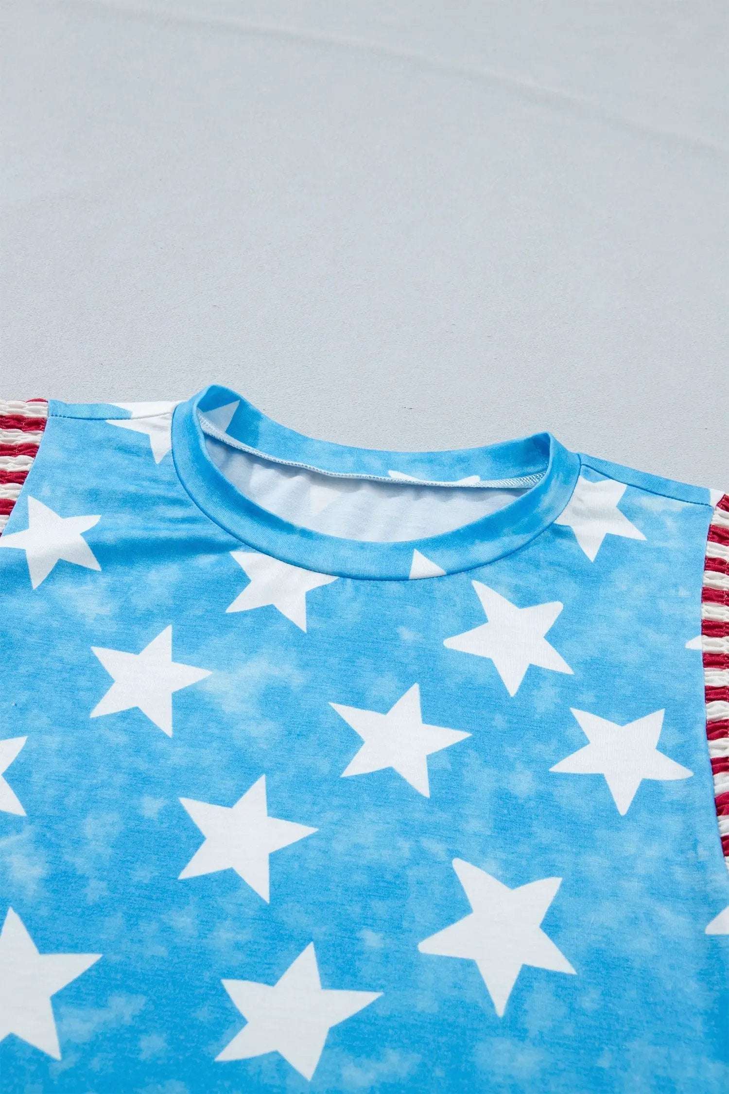Patriotic Ruffle Sleeve Top with star print striped detail and ruffle sleeves