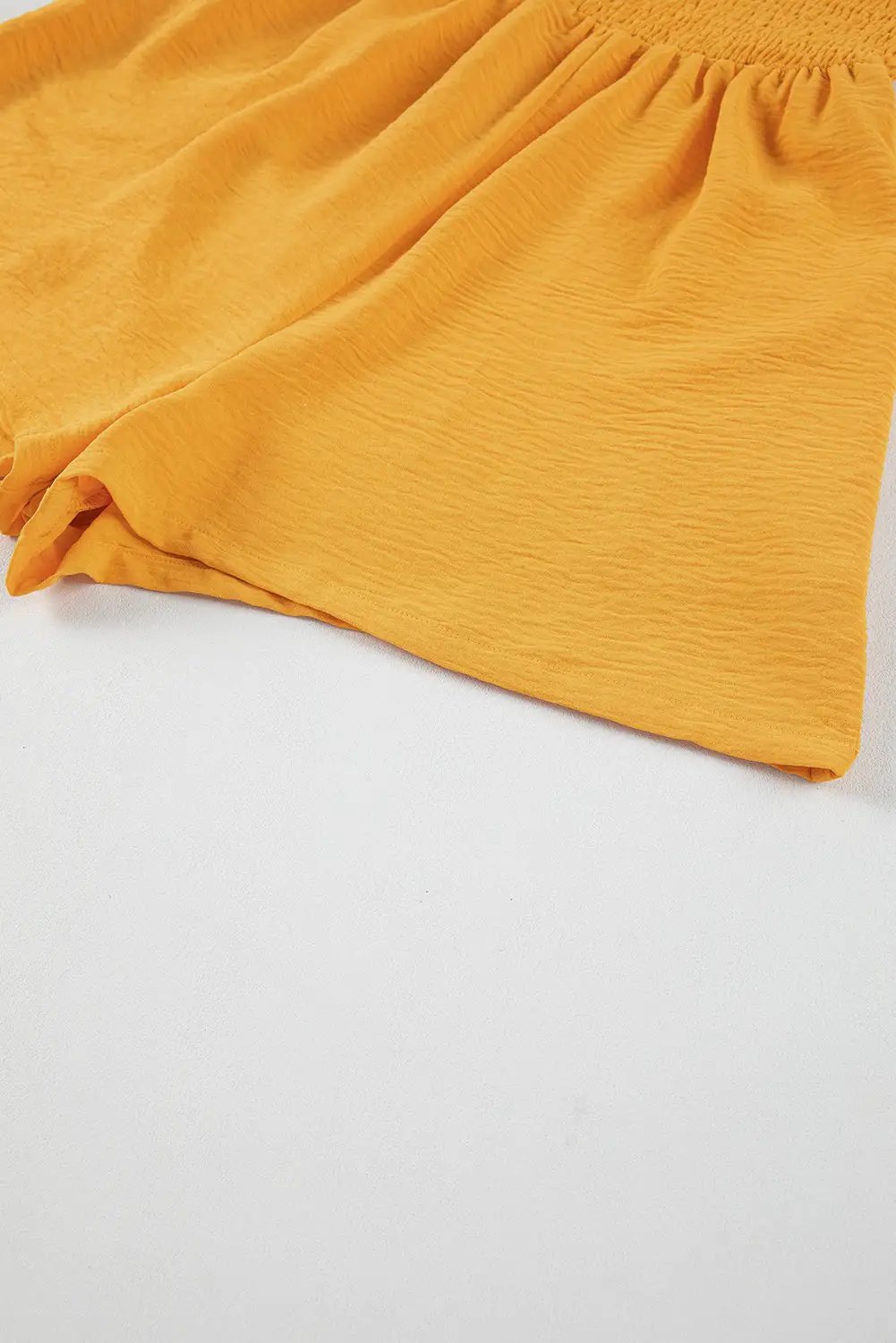 pocketed smocked romper