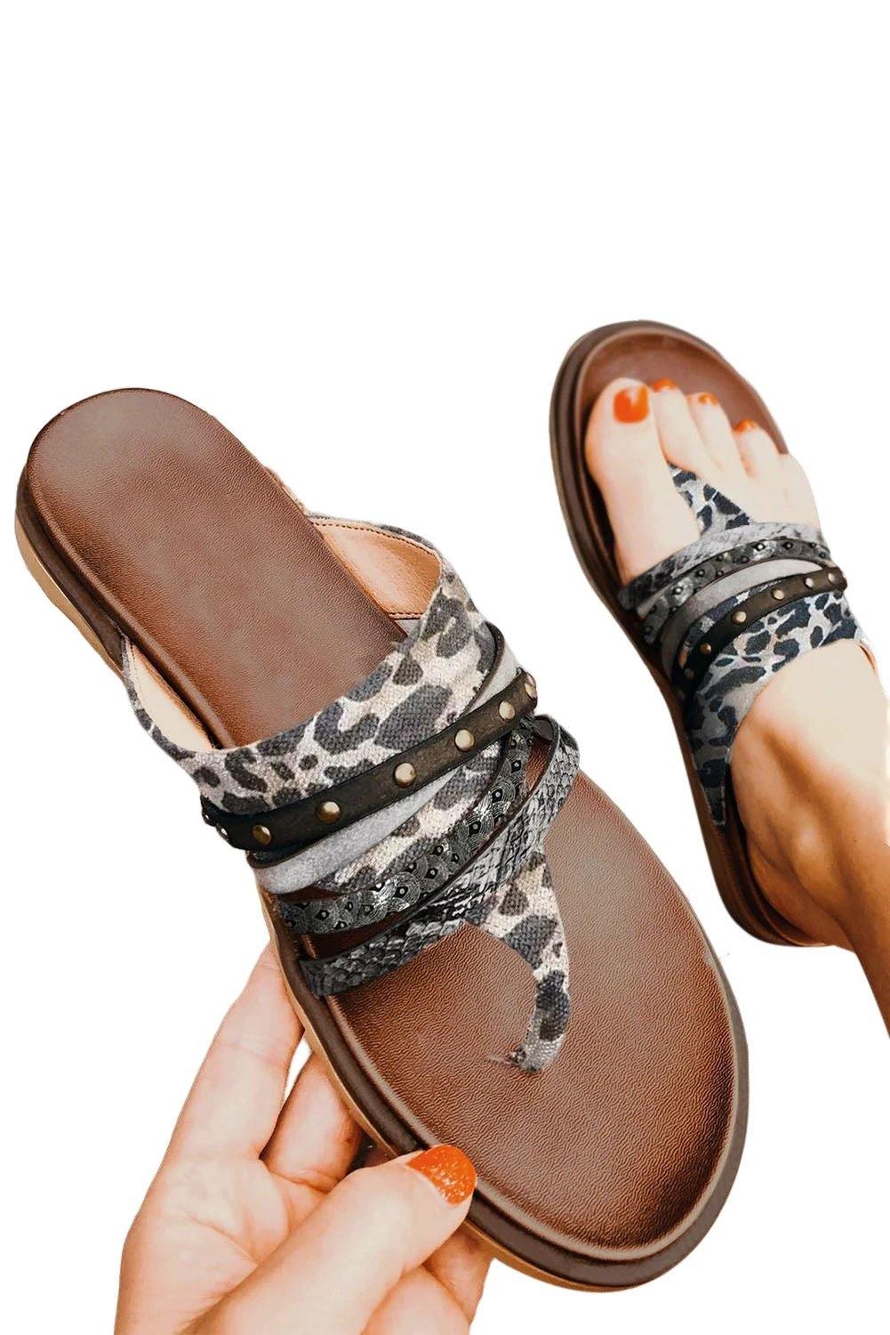 Leopard studded animal print flip flop sandals with cushioned footbed and multi-strap design