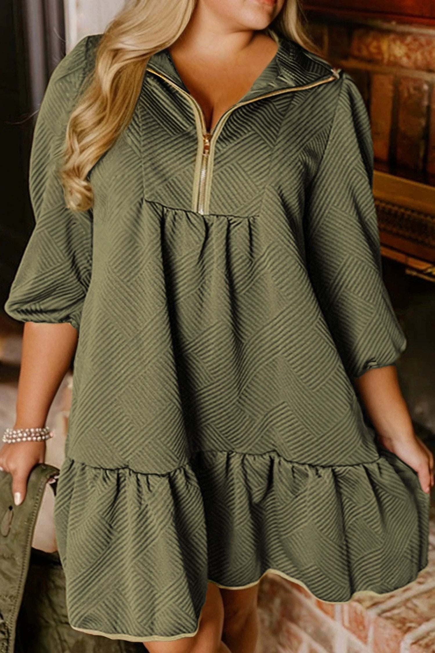 Plus size jungle green textured mini dress with contrast trim quarter zip and puff sleeves