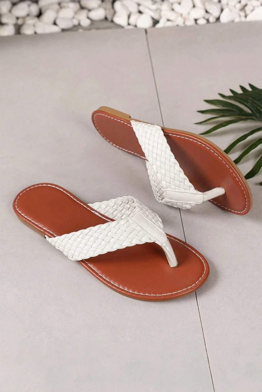 White braided strap PU leather flip flop with flat cushioned sole for casual summer wear