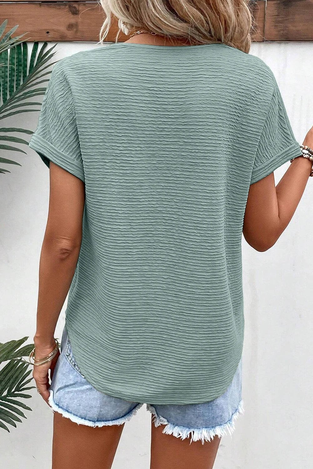   textured pink V-neck tee 