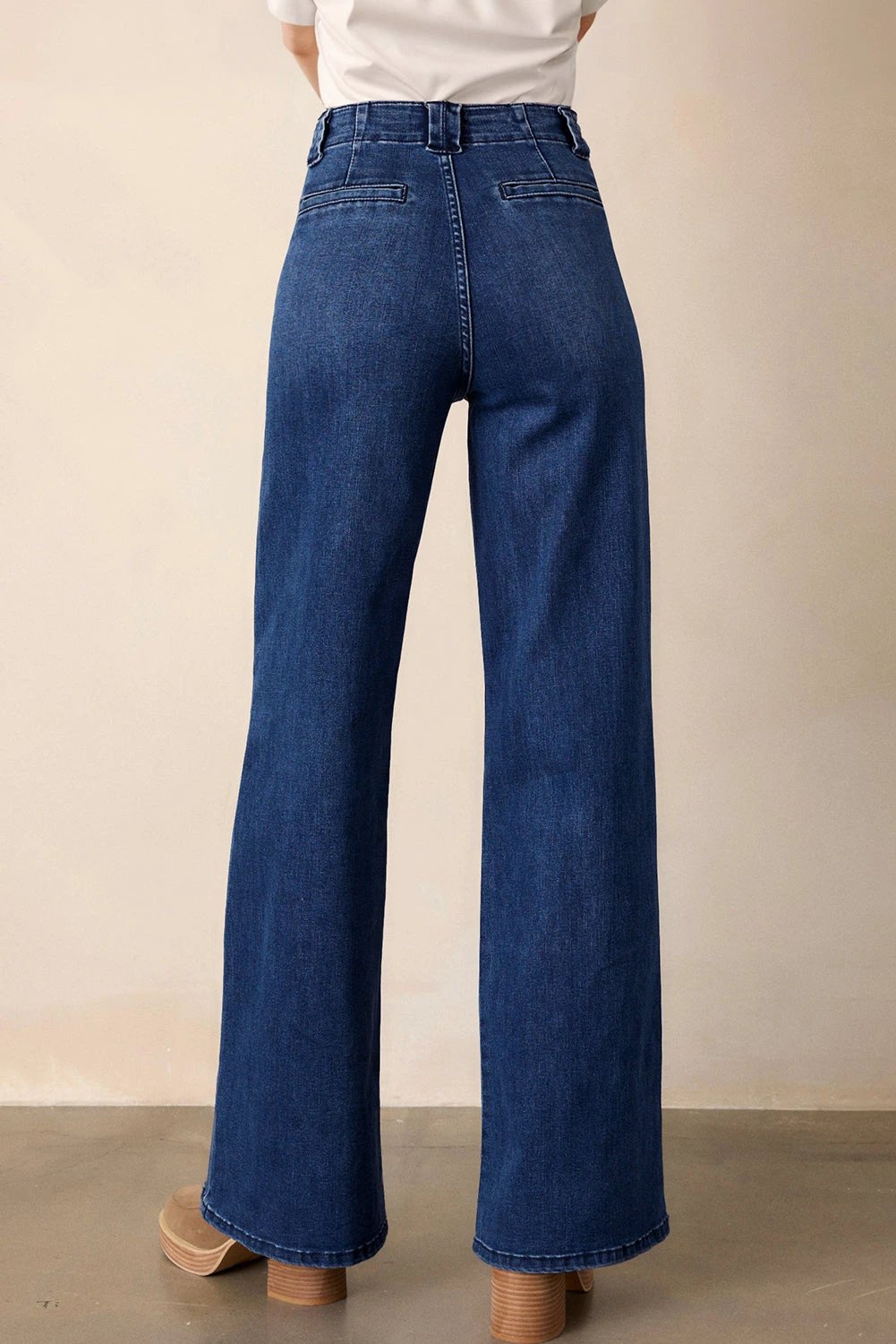 Dirty blue mid-rise straight-leg Chic Mom jeans on model