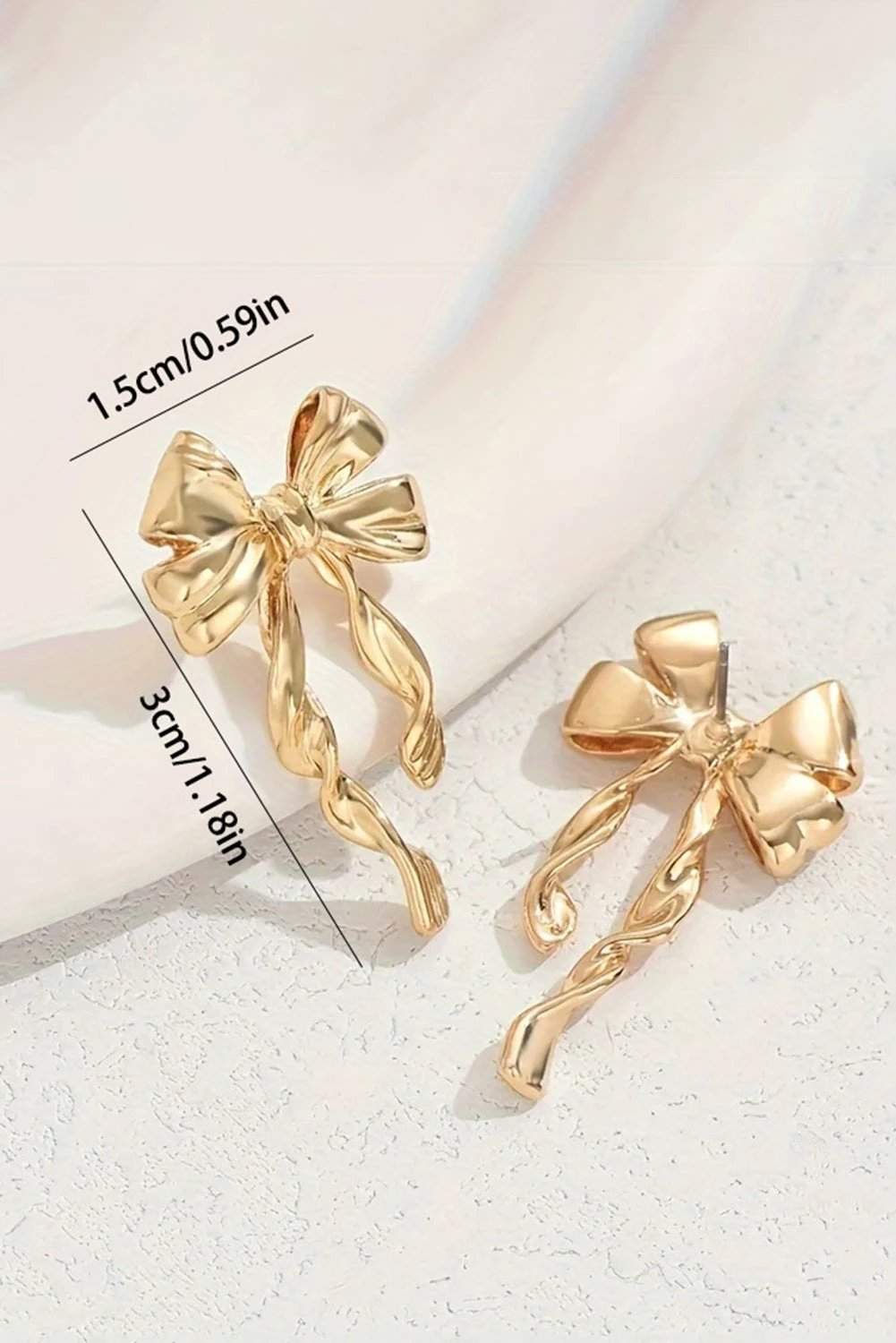 gold bow knot plated alloy stud earrings for women casual everyday outfit